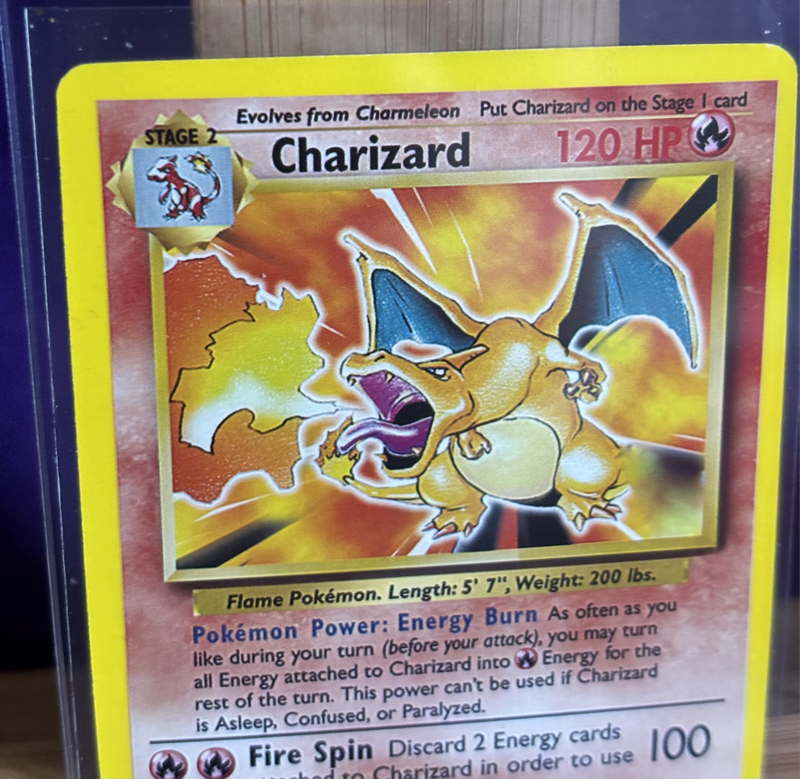 Pokemon Charizard 4/102 Rare 1999 version from 2022 Sword & Shield Astral Radiance set Mint