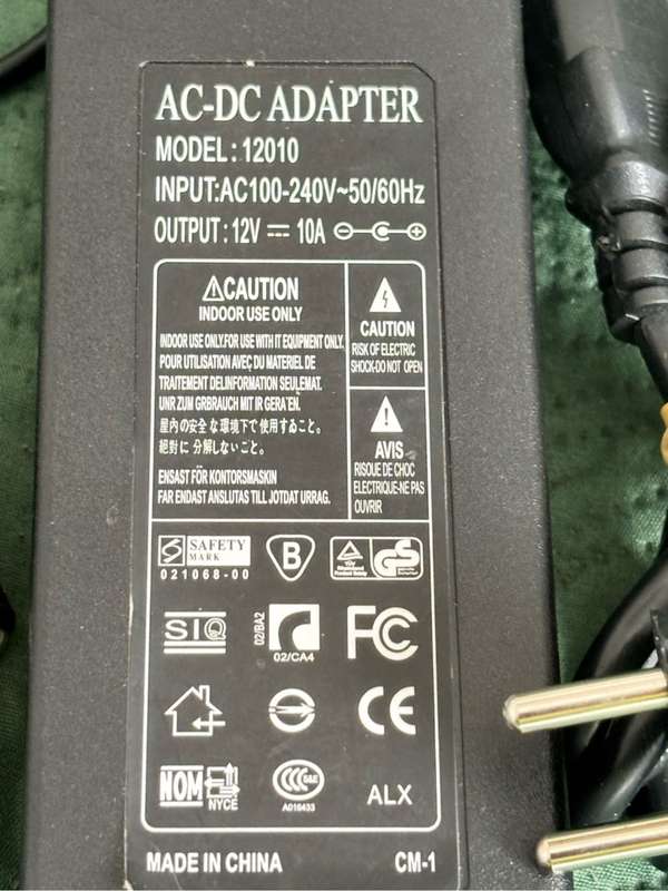 AC-DC Adapter model 12010 with attachment input