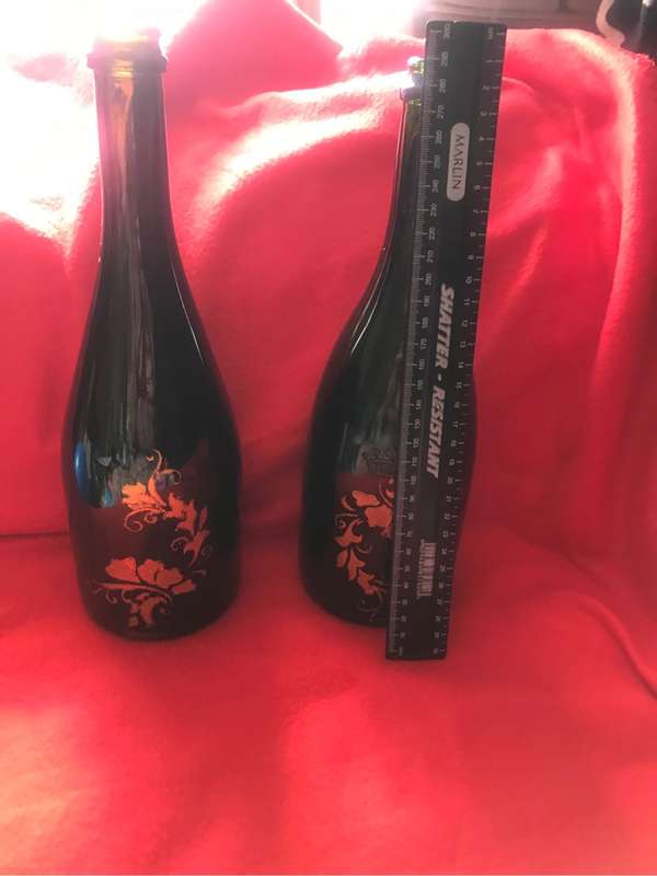 Beautiful green with gold painting on Two Bottles