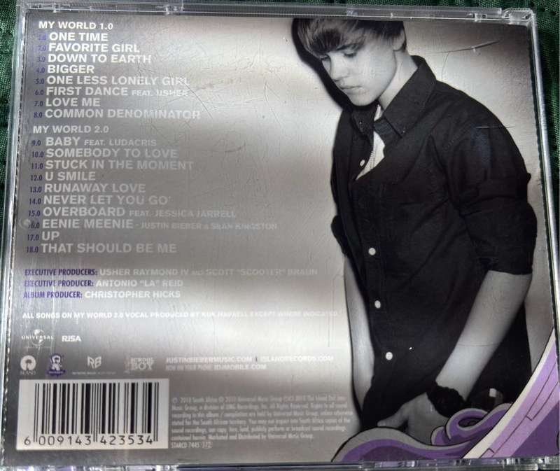 Justin Bieber CDs x 2, Under the Mistletoe & My Worlds