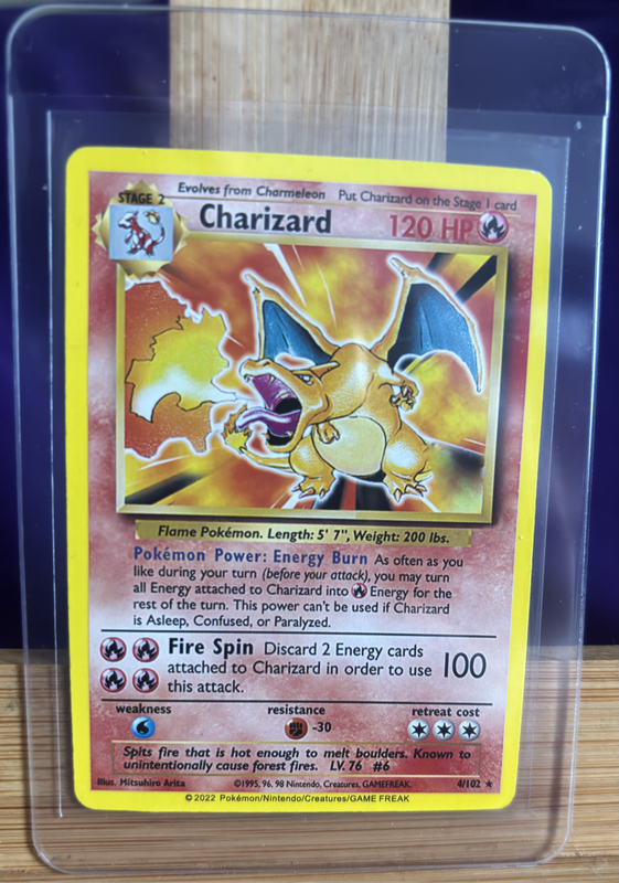 Pokemon Charizard 4/102 Rare 1999 version from 2022 Sword & Shield Astral Radiance set Mint