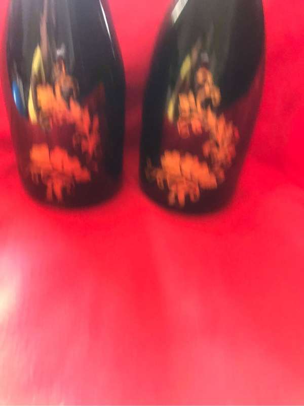 Beautiful green with gold painting on Two Bottles