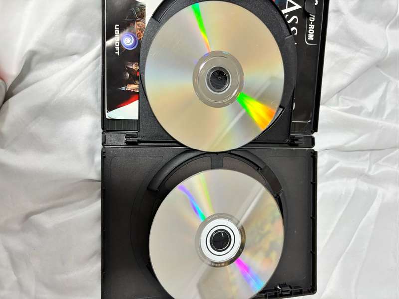 PC DVD ROM Assassins Creed Two Games Revelations, Creed 3 both special editions two disks each