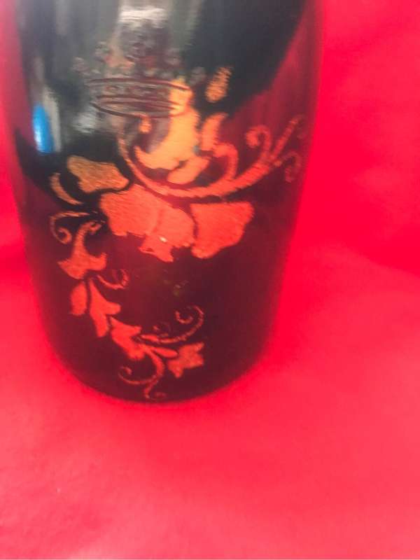 Beautiful green with gold painting on Two Bottles
