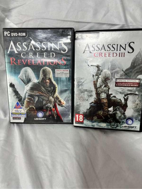 PC DVD ROM Assassins Creed Two Games Revelations, Creed 3 both special editions two disks each