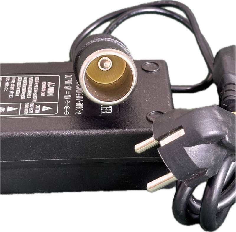 AC-DC Adapter model 12010 with attachment input