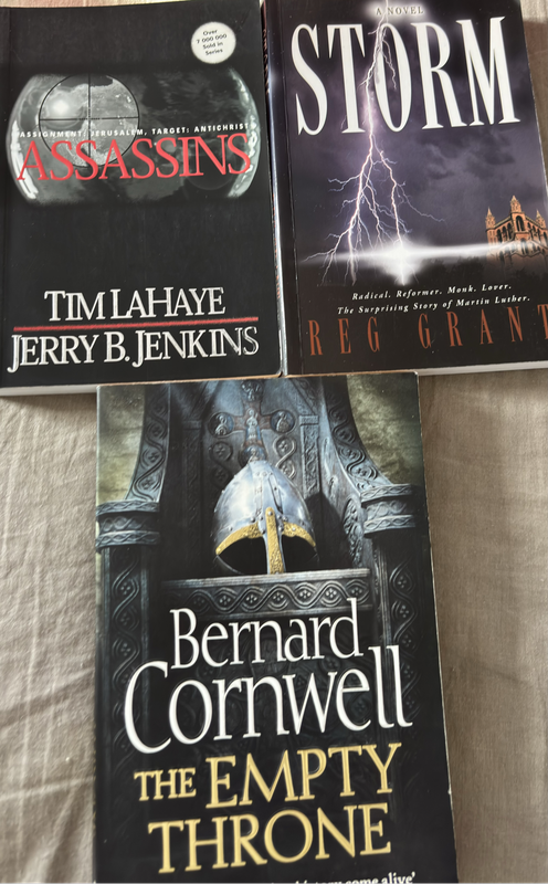 3 Novels Bernard Cornwell The Empty Throne, Assassins Tim Lahaye & Storm  Reg Grant