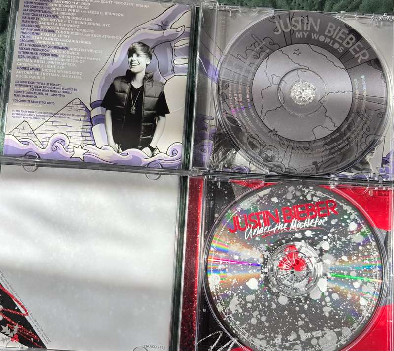 Justin Bieber CDs x 2, Under the Mistletoe & My Worlds