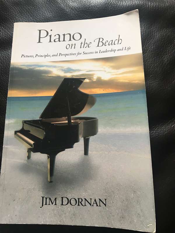 Piano on the Beach by Jim Dorman