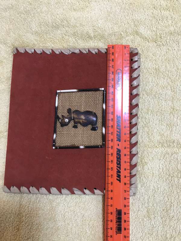 Book cover handmade orange with rhino front cover