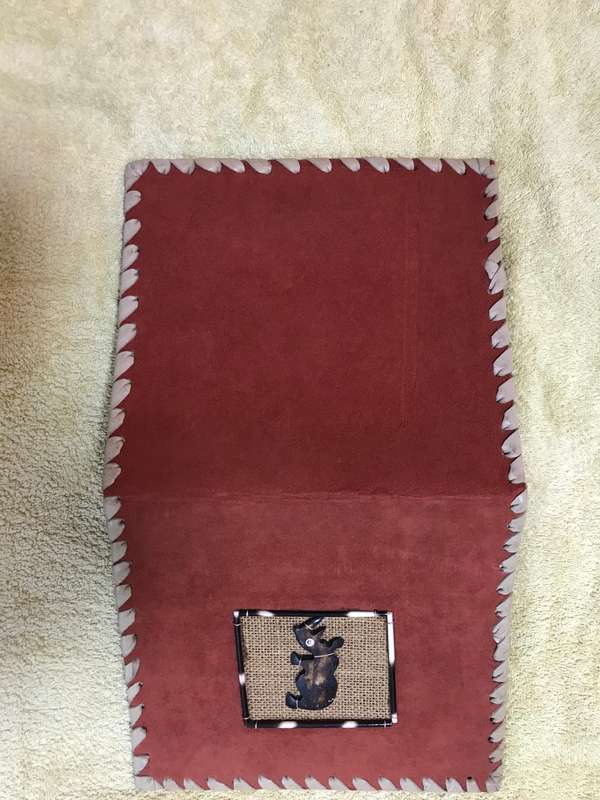 Book cover handmade orange with rhino front cover