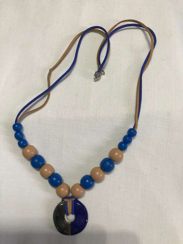 Necklace with blue pendant
