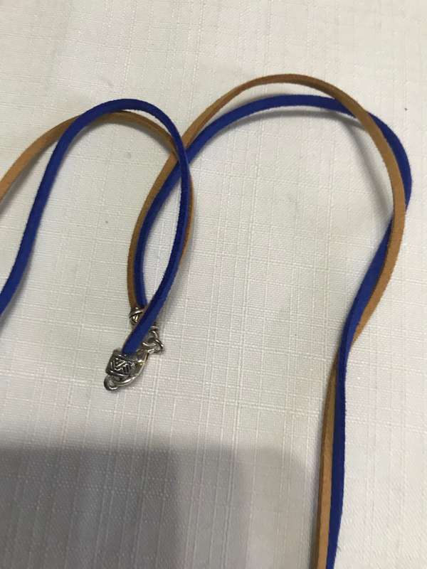 Necklace with blue pendant