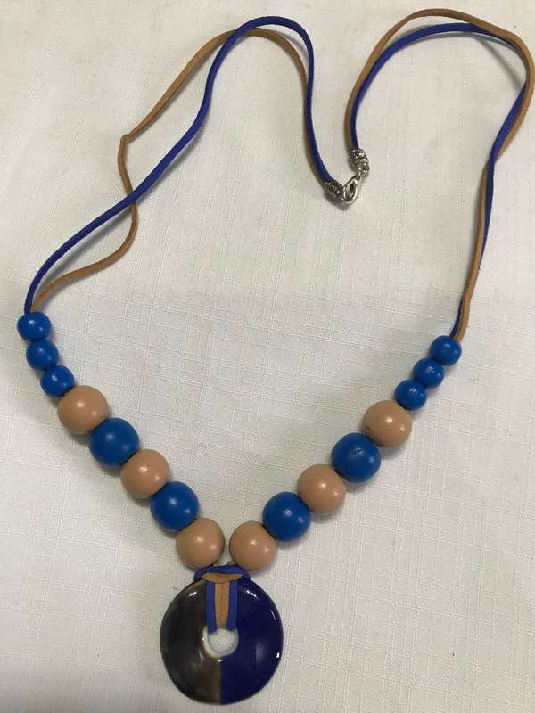 Necklace with blue pendant