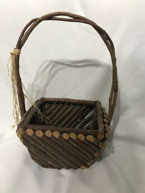 Rustic handcrafted wooden basket