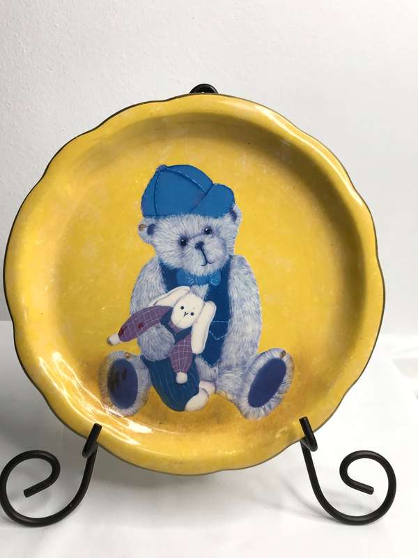 Art Plate Hand Painted Bear holding toy on Yellow signed by artist Sharon 04/03 is 19cm