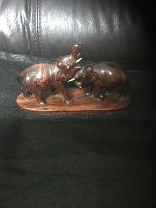 Hand carved wooden Elephants playful collectable