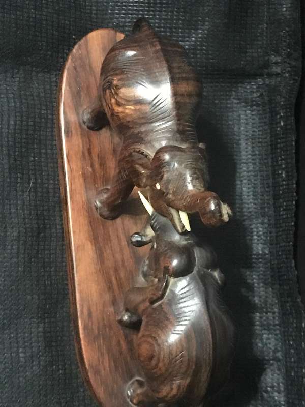 Hand carved wooden Elephants playful collectable