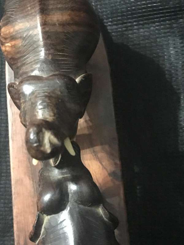 Hand carved wooden Elephants playful collectable