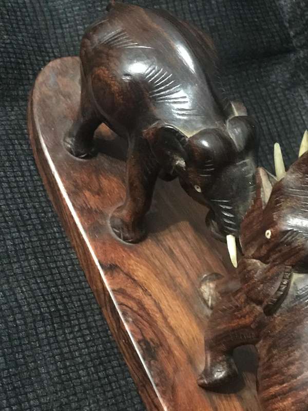 Hand carved wooden Elephants playful collectable