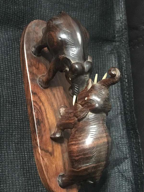 Hand carved wooden Elephants playful collectable