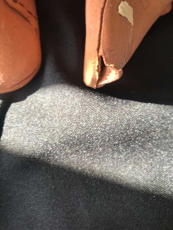 Clay pottery two shoes