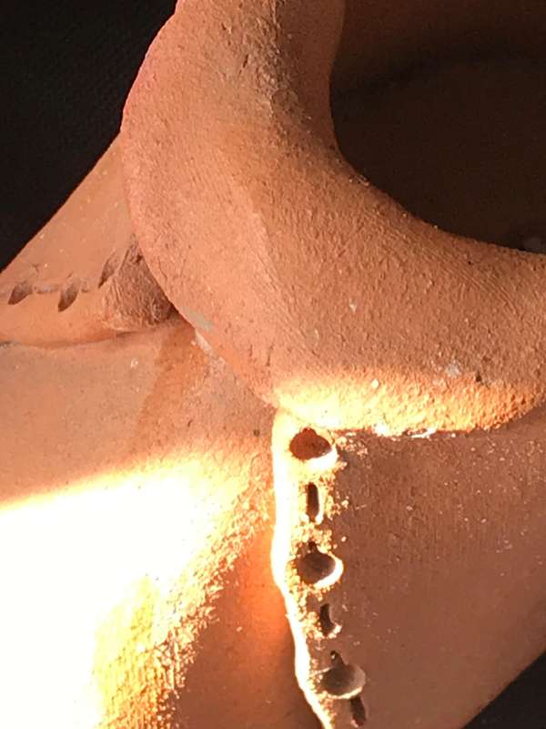 Clay pottery two shoes