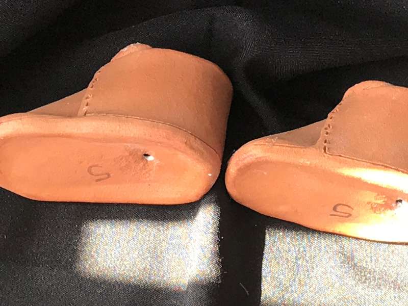 Clay pottery two shoes