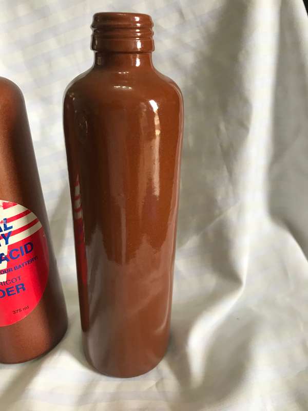 Two stoneware vintage bottles