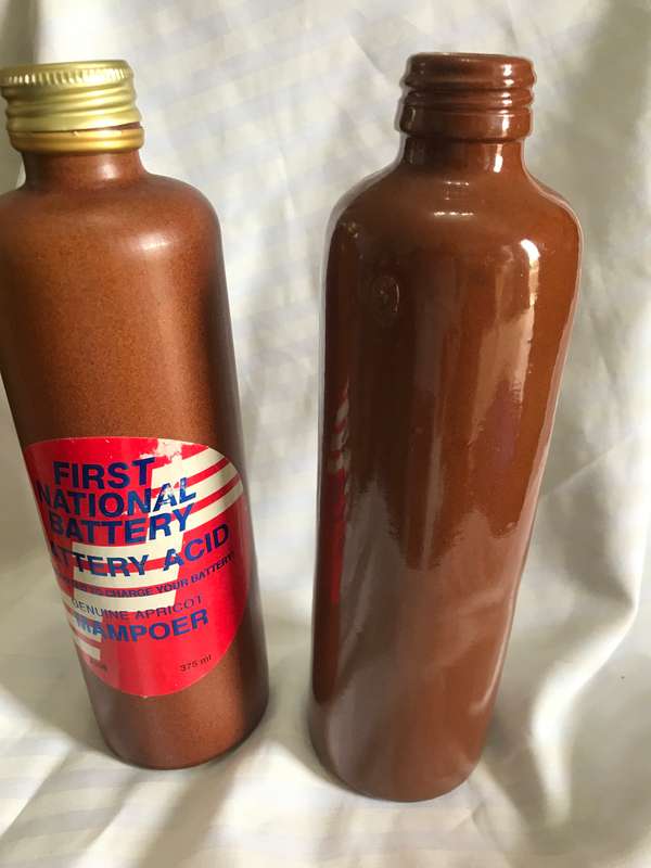 Two stoneware vintage bottles