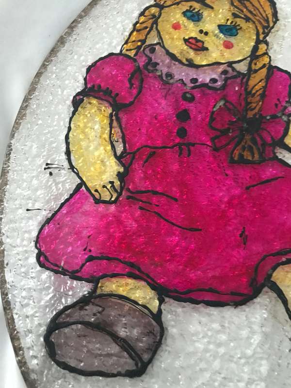 Vintage doll painted on plastic decor