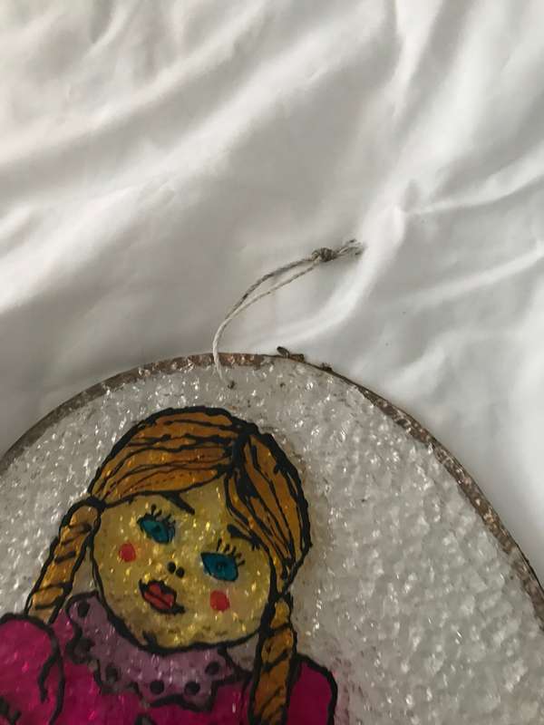 Vintage doll painted on plastic decor