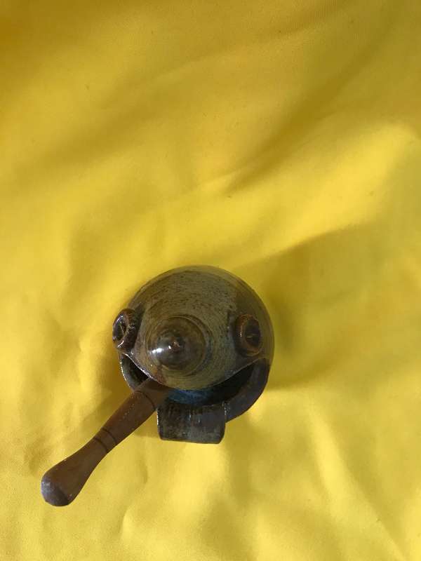 Pottery bowl with wooden spoon