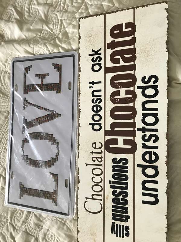 Tin and wood sign