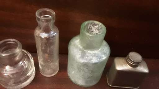 Vintage Four Medisyne small Botlles glass