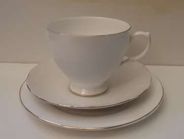 Queen Anne England Trio , cup , saucer and cake side plate