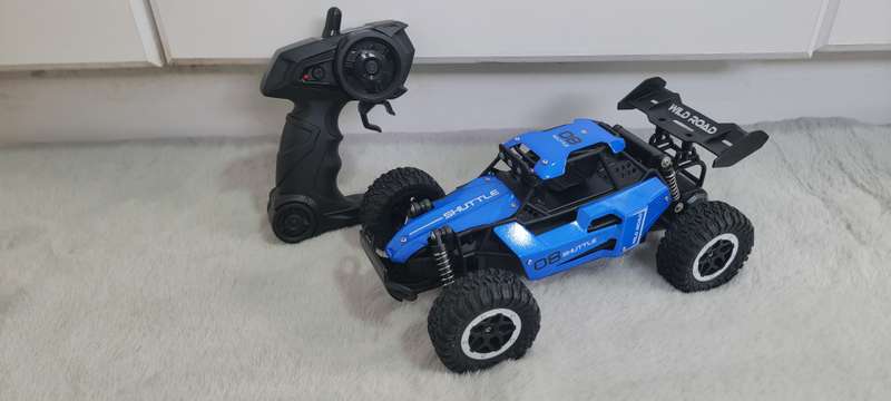 Brand New! 2.4Ghz Remote Control Car, 20KM/H Speed, Rechargeable, Big Rubber Tires, Blue Color