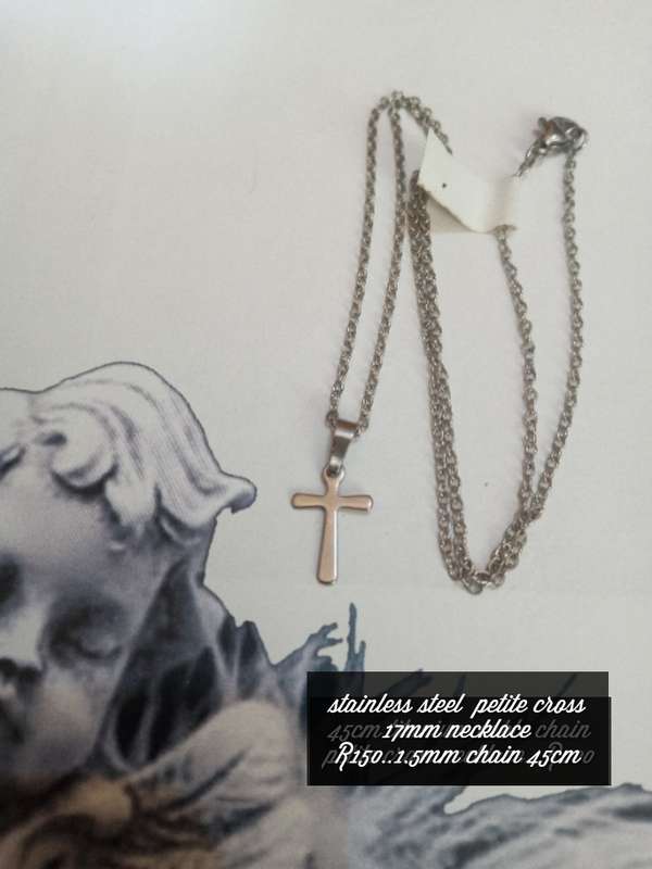 Stainless steel petite cross necklace ..high quality won't fade or tarnish