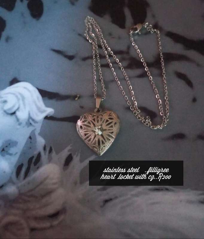 Stainless steel heart locket with cz ..High quality won't fade or tarnish