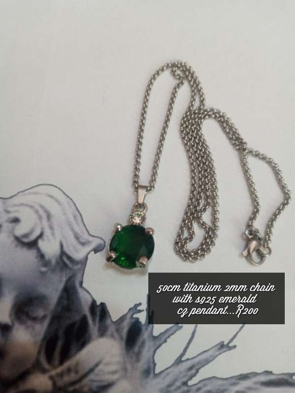 Titanium & emerald cz necklace..high quality won't fade or tarnish