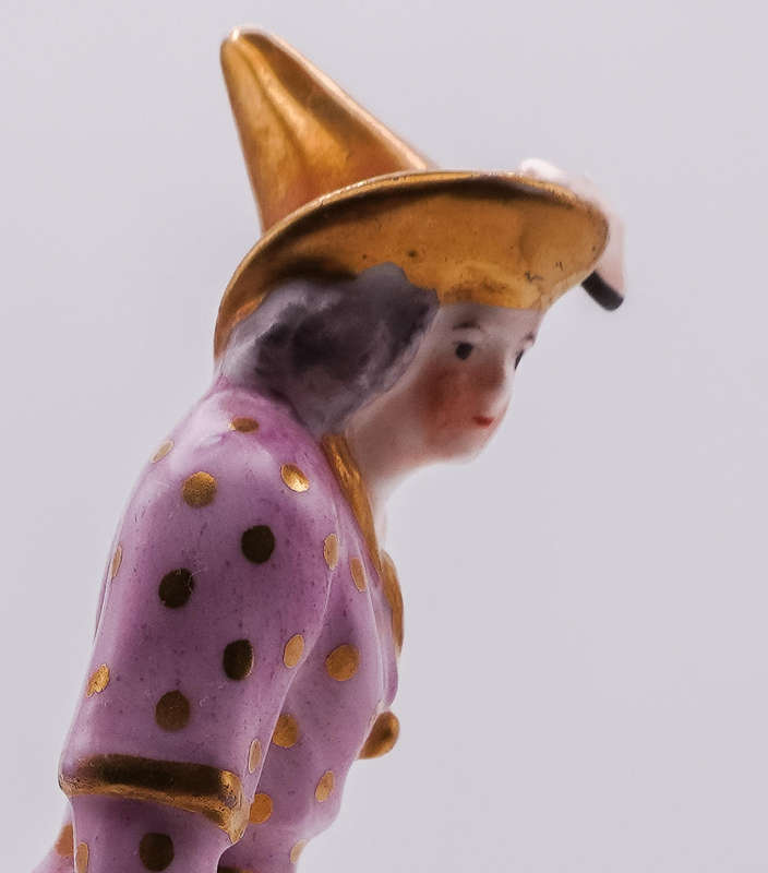 Antique German Porcelain Harlequin Figurine  Hand Painted, Gilt Accents, Holding Mask