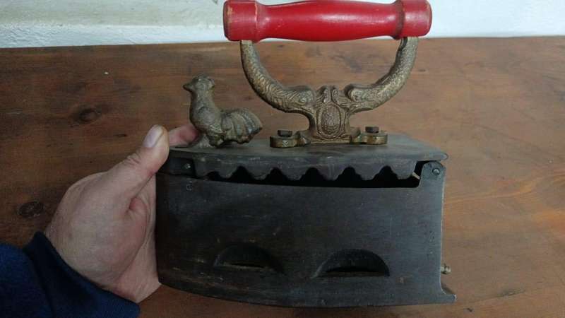 wow - Old vintage heavy solid Brass Coal Iron with wooden handle with Rooster motif.