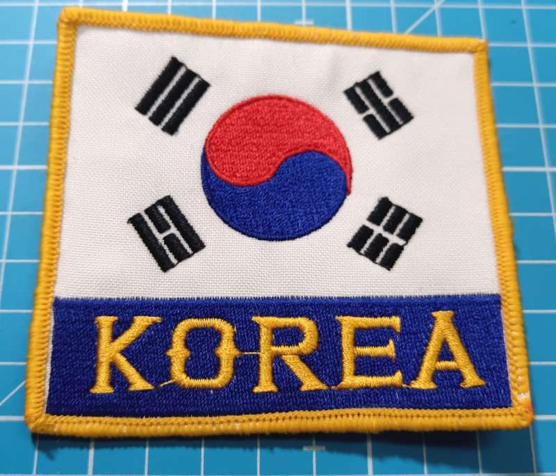 International - Patch Badge