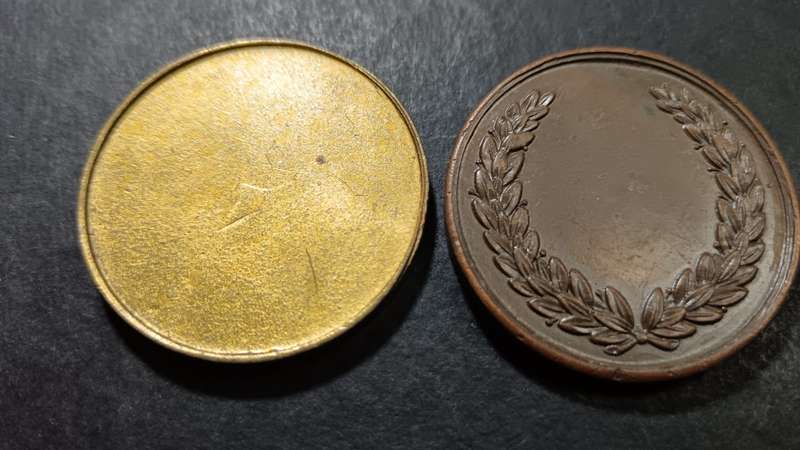 Pair of Shooting Medallions