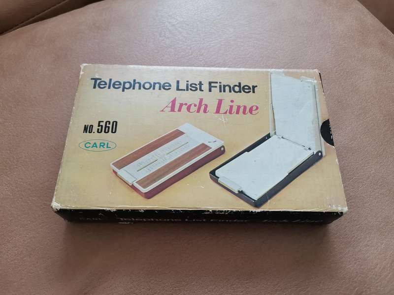 Vintage Carl telephone list finder