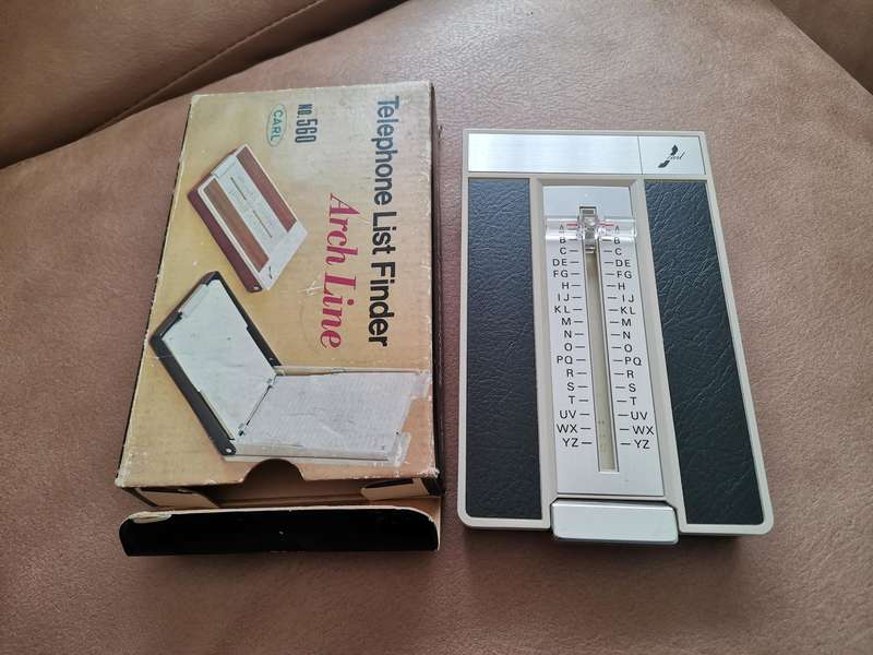 Vintage Carl telephone list finder