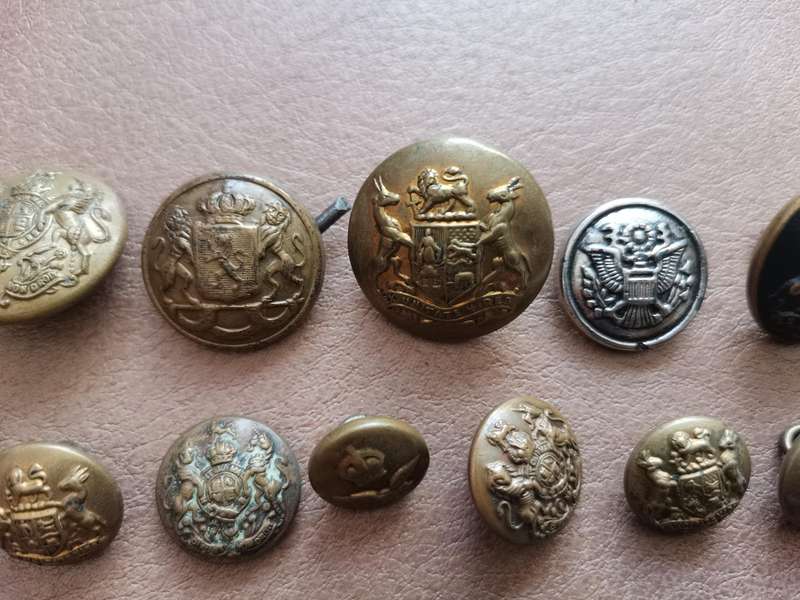 27 brass military buttons