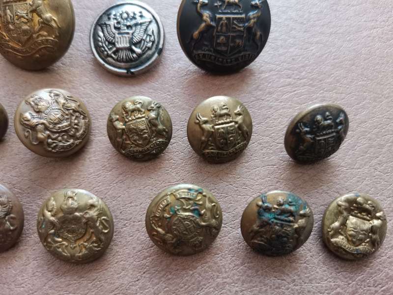 27 brass military buttons