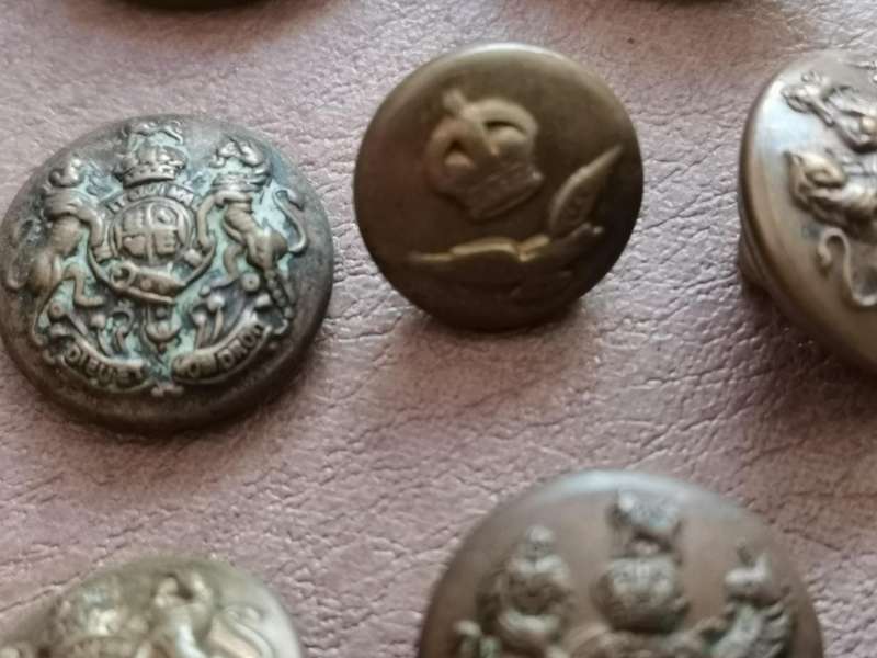 27 brass military buttons