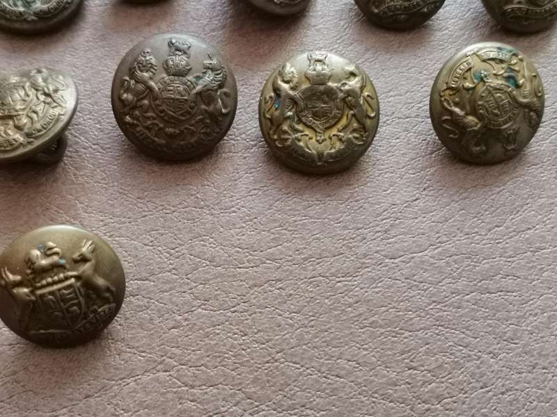 27 brass military buttons